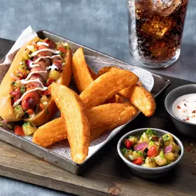 Simplot SeasonedCRISP® Delivery+® Savory Battered 8 Cut Crinkle Cut Wedges, Skin On, Styled
