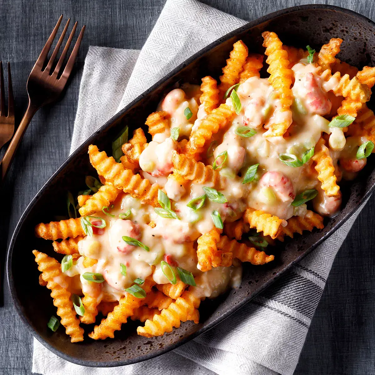 Simplot SeasonedCRISP® Delivery+® Savory Battered Deep V Crinkle Cut Fries, Skin On, Styled