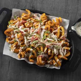 Simplot SeasonedCRISP® Delivery+® Bucles con sabrosa cobertura, con cáscara, Estilo