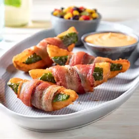 Simplot SeasonedCRISP® Delivery+® Savory Battered 6 Cut Crinkle Cut Wedges, Skin On, Styled