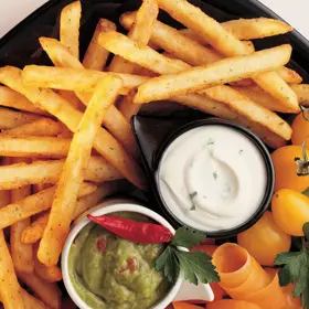 Simplot SeasonedCRISP® Delivery+® Savory Battered Straight Cut Fries, Skin On, In Use
